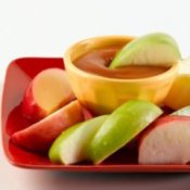 Plate of apples and caramel dip.