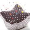 Fabric pincushion with polka dot top and gingham base