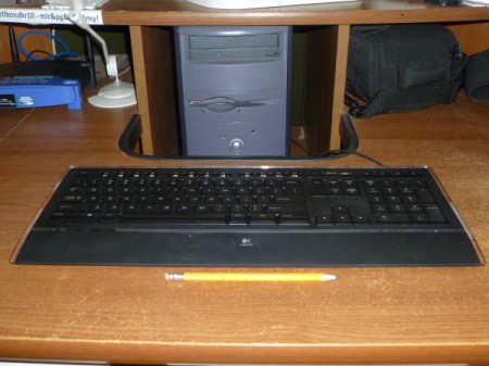 A front view of a very thin keyboard.