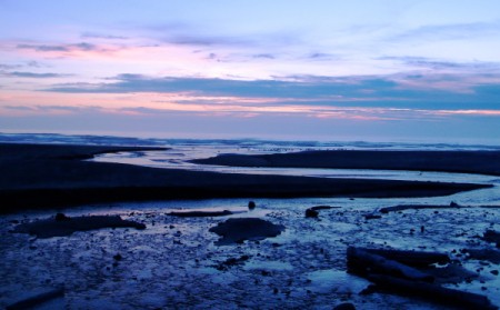 Water Flowing Across Whiskey Run Beach at Sunset