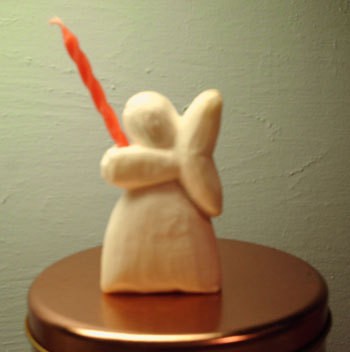 Photo of an angel carved out of soap.