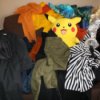 Clothes Piled on a Couch After Shopping Trip
