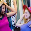 Women Trying on Hats