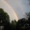 Large Double Rainbow Over Trees