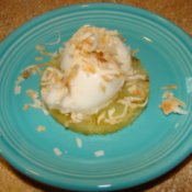 Grilled pineapple topped with coconut sorbet and toasted coconut.