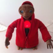 ET doll in a red hoodie.