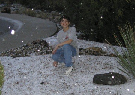 Young man in the snow in Arizona