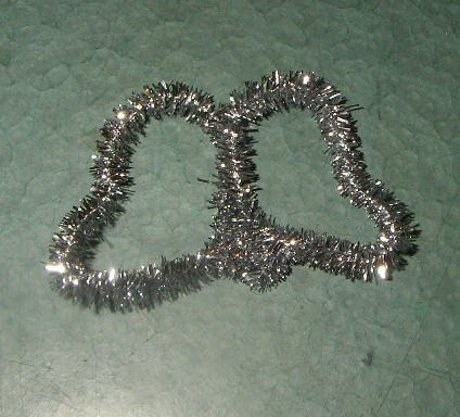 Silver chenille wings.