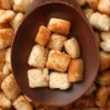 Croutons on a Wooden Spoon