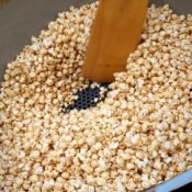 Wooden Spoon Stirring Kettle Corn