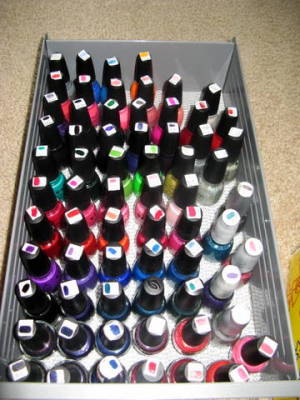 Bin with dozens of bottles of nail polish.