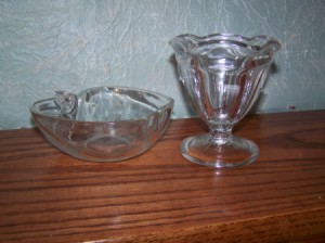 Apple shaped and stemmed glass dishes after cleaning.