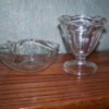 Apple shaped and stemmed glass dishes after cleaning.