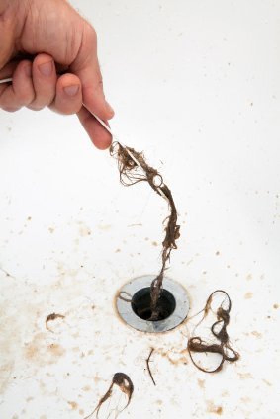 bathroom sink clogged with hair