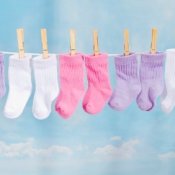 Pairs of Baby Socks on a Clothesline