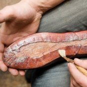 Man Repairing a Shoe