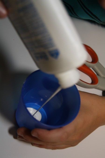 Pouring Glue in Blue Cup