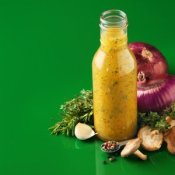 A bottle of homemade salad dressing.