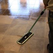 Saving Money on Swiffer Pads and Mops, Linoleum Floor Being Mopped