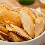 Homemade potato chips in a bowl.