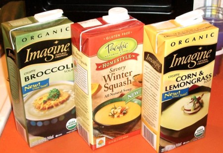 Three boxes of Pacific brand soup.