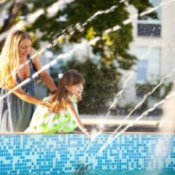 Free Entertainment Ideas, Mother and Daughter Playing in a Fountain