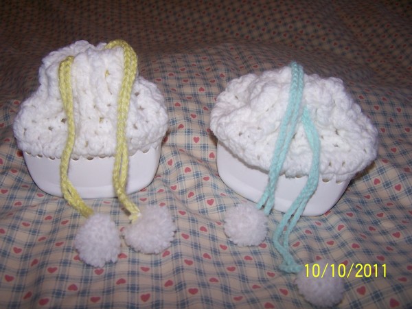 Purses closed with pull string.