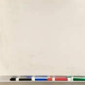 A dry erase board and markers.