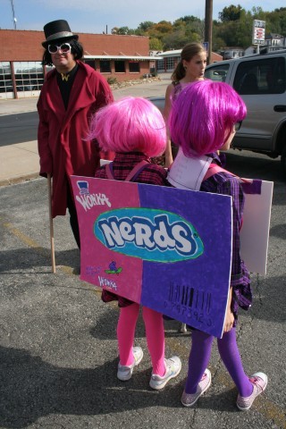 Girls Turned Away to See Back of Nerds Costume