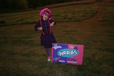 Girl Standing in Grass With Nerds Box Costume