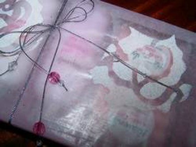 Gift wrapped in decorated wax paper.