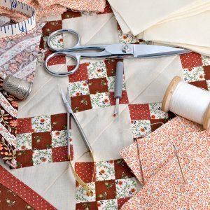 Nine patch block and tools for quilting.