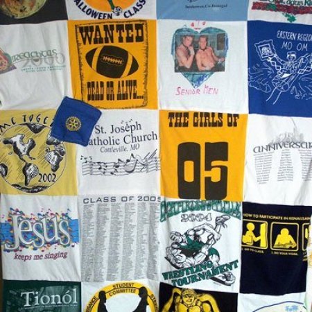 Photo of a quilt made with tshirts.