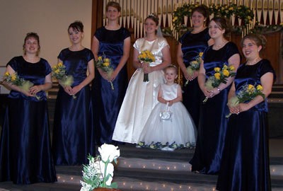 Photo of girls wearing homemade bridesmaid dresses.