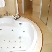 Luxury bathroom with jetted tub.