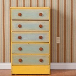 A colorful wooden dresser.