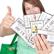 Woman Holding Handful of Coupons with Thumbs Up