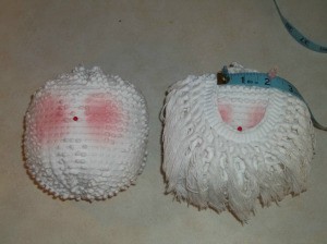 Coloring cheeks and adding fringe beard.