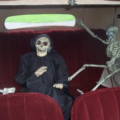 Halloween Skeleton in Back of Car with Red Upholstery
