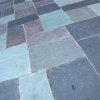 Cleaning Tile Floors, Textured blue floor tile.