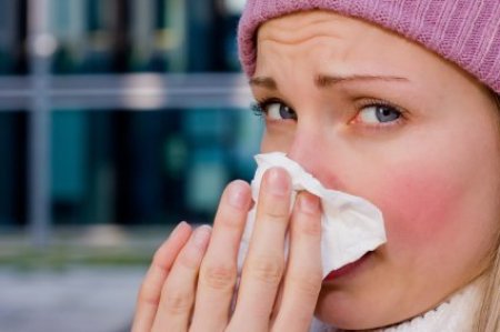 Preventing Colds and Flu, Woman with a Cold Blowing Her Nose