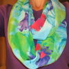 Infinity scarf, finished and around neck of creator.