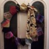 A Christmas wreath made from neckties.