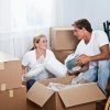 Young Couple Packing for A Move