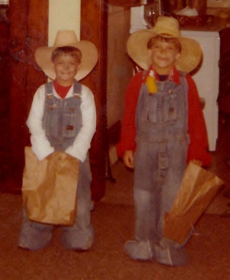Two boys dressed up as cowboys for Halloween.