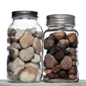 Rocks inside two mason jars.