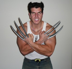 A homemade Wolverine (X-Men) costume with yellow eyes and long metal claws.