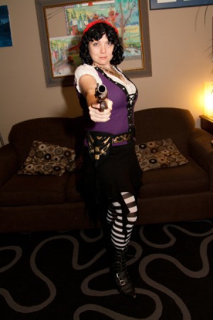 Girl Pirate with Gun Pointing at Camera