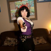Girl Pirate with Gun Pointing at Camera