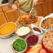 A woman preparing a Thanksgiving meal.